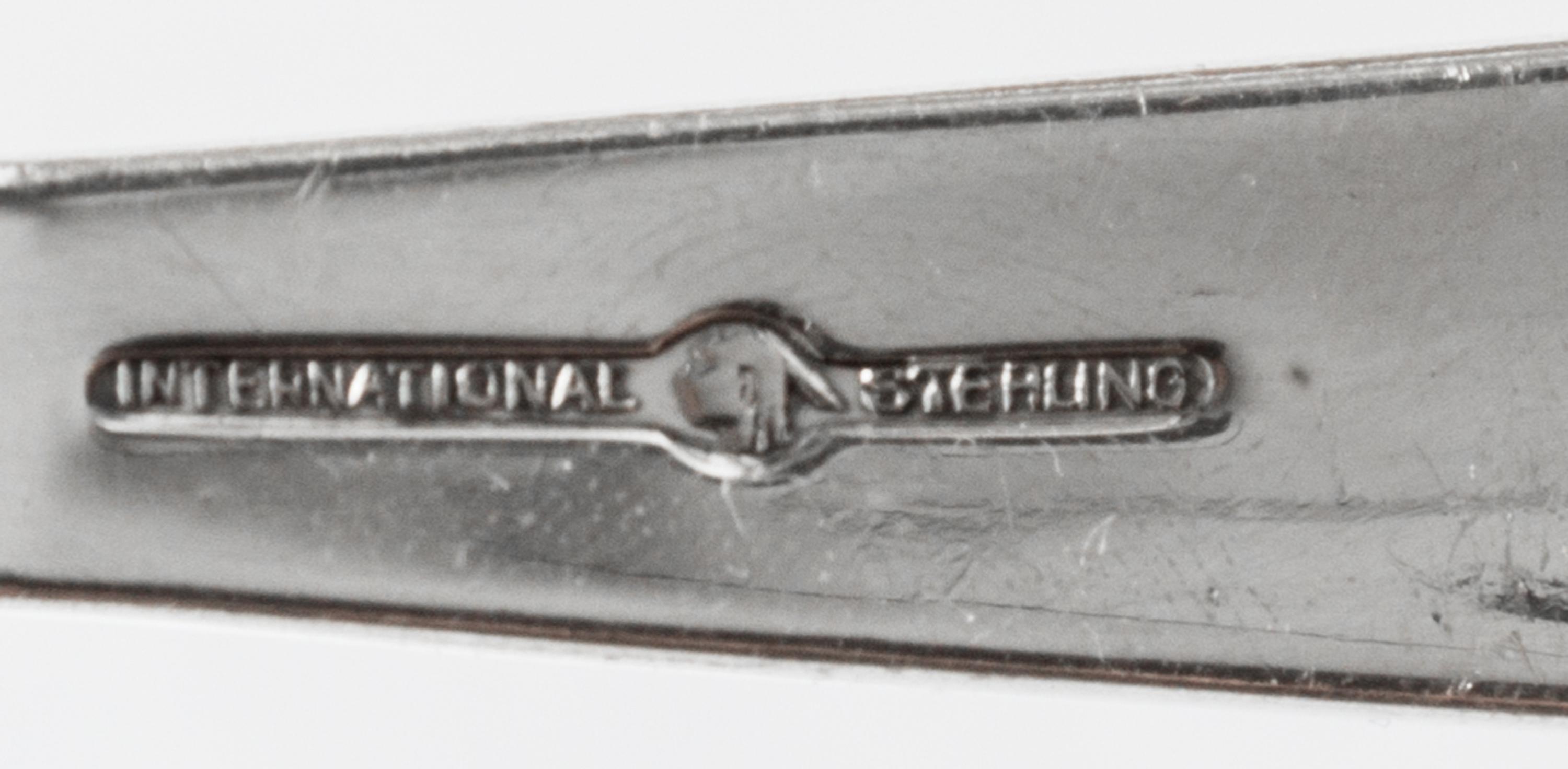 An American Silver Flatware Service, International Silver Co., Meriden, CT,, Empress pattern, comprising: 24 salad forks 12 dinner fork