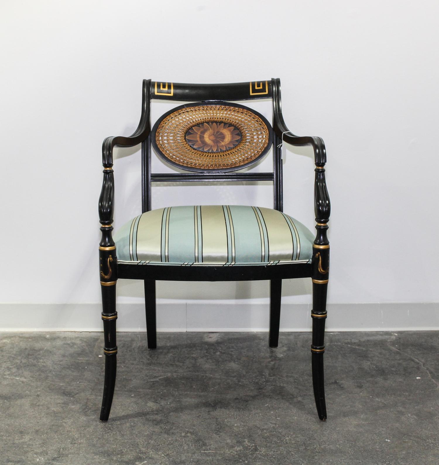 A Regency Style Ebonized Parcel-Gilt Open Armchair Height 33 3/4 inches. — 20TH CENTURY