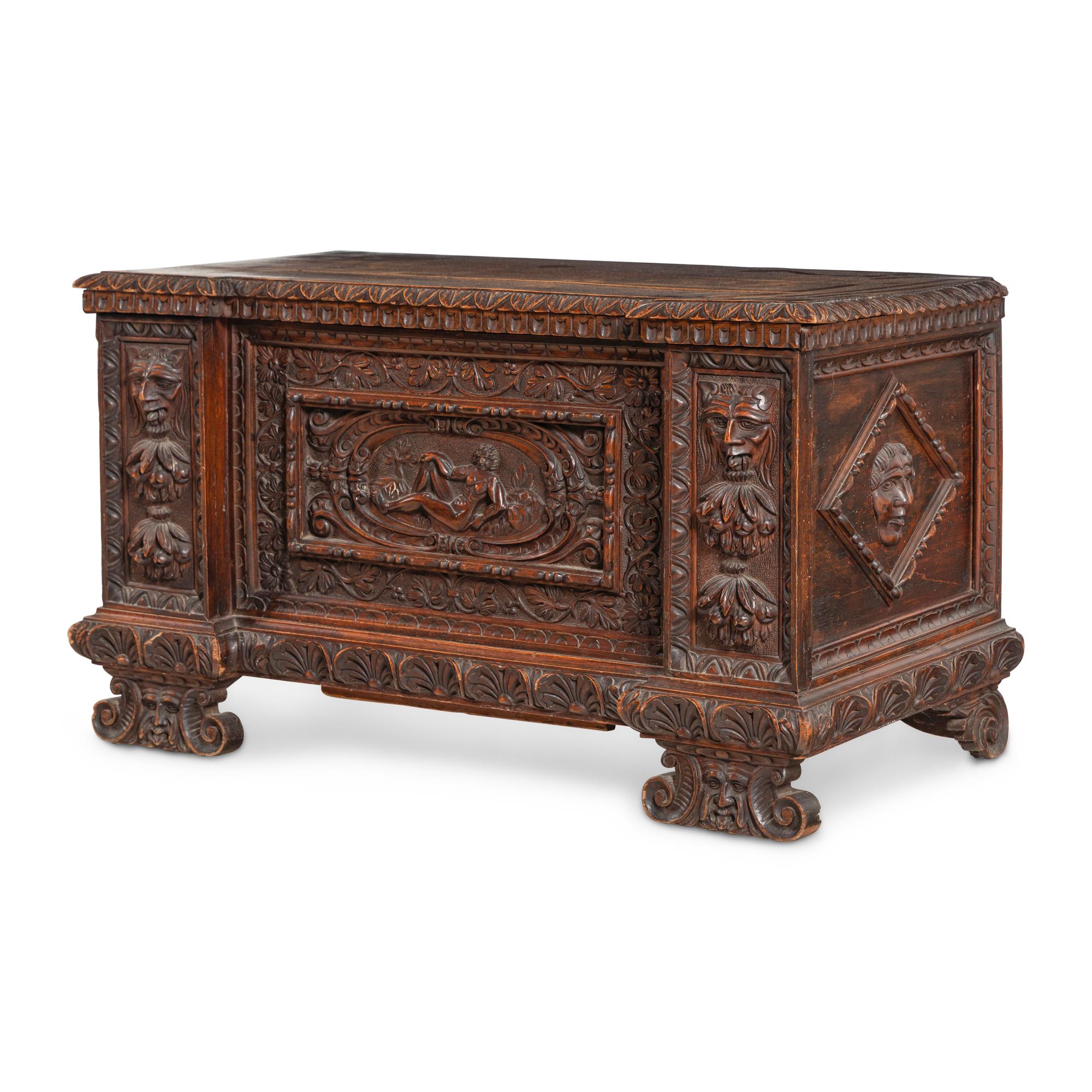 An Italian Carved Walnut Coffer