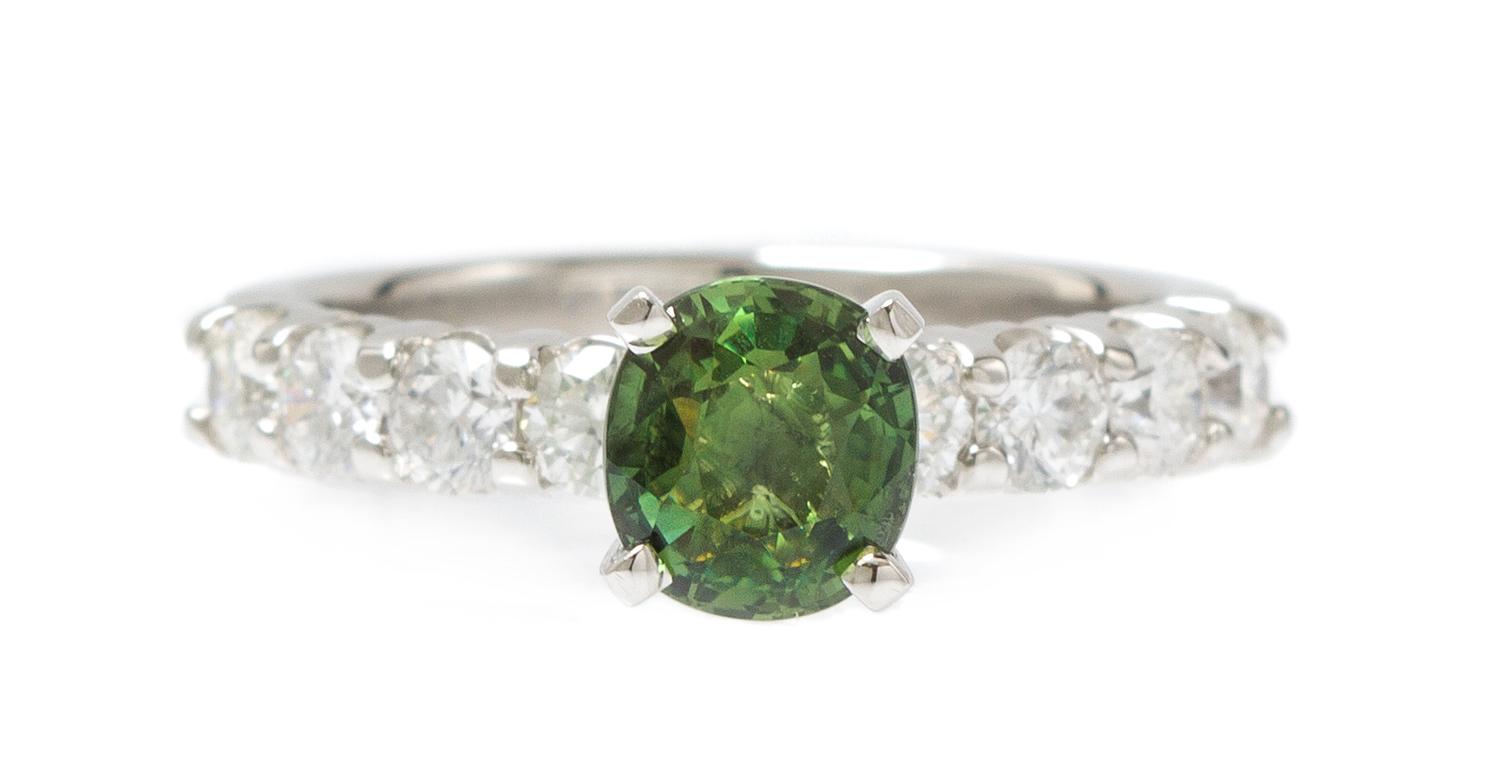 A Platinum, Green Sapphire and Diamond Ring, 4.30 dwts.