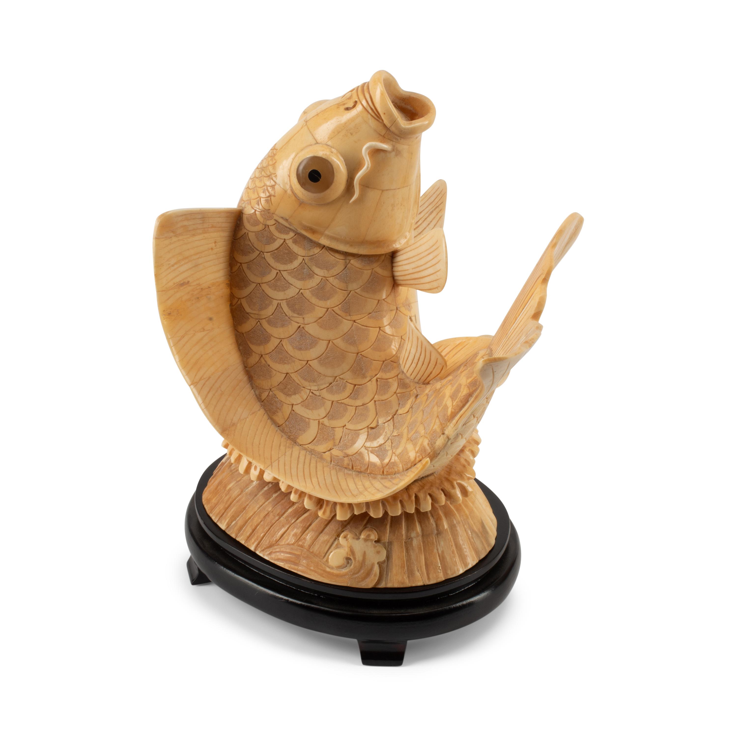 A Pair of Japanese Bone-Veneered Fish Sculptures