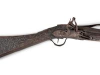 An Egyptian or Near Eastern Metal Inlaid Flintlock Rifle