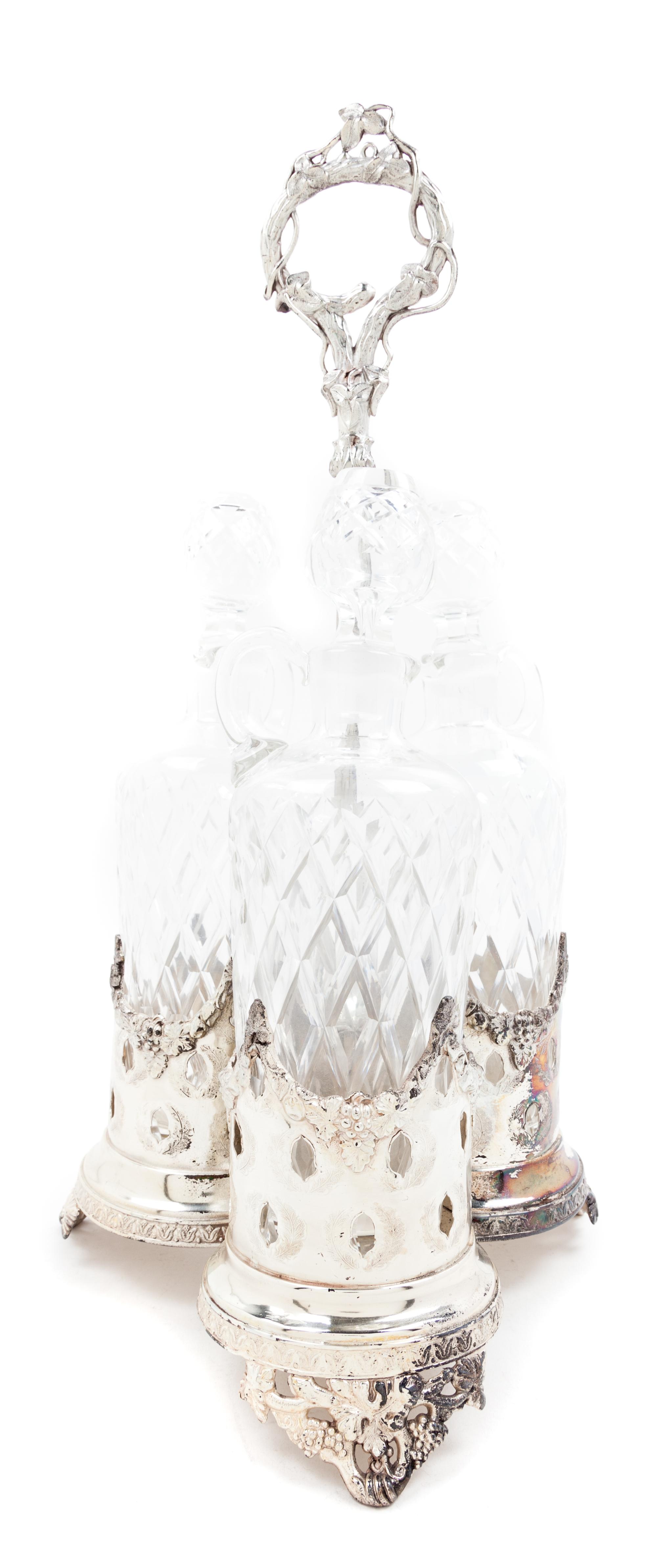 A Silver-plate Liquor Caddy Height overall 19 1/2 inches.