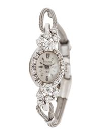 BULOVA, 14K WHITE GOLD AND DIAMOND DRESS WATCH