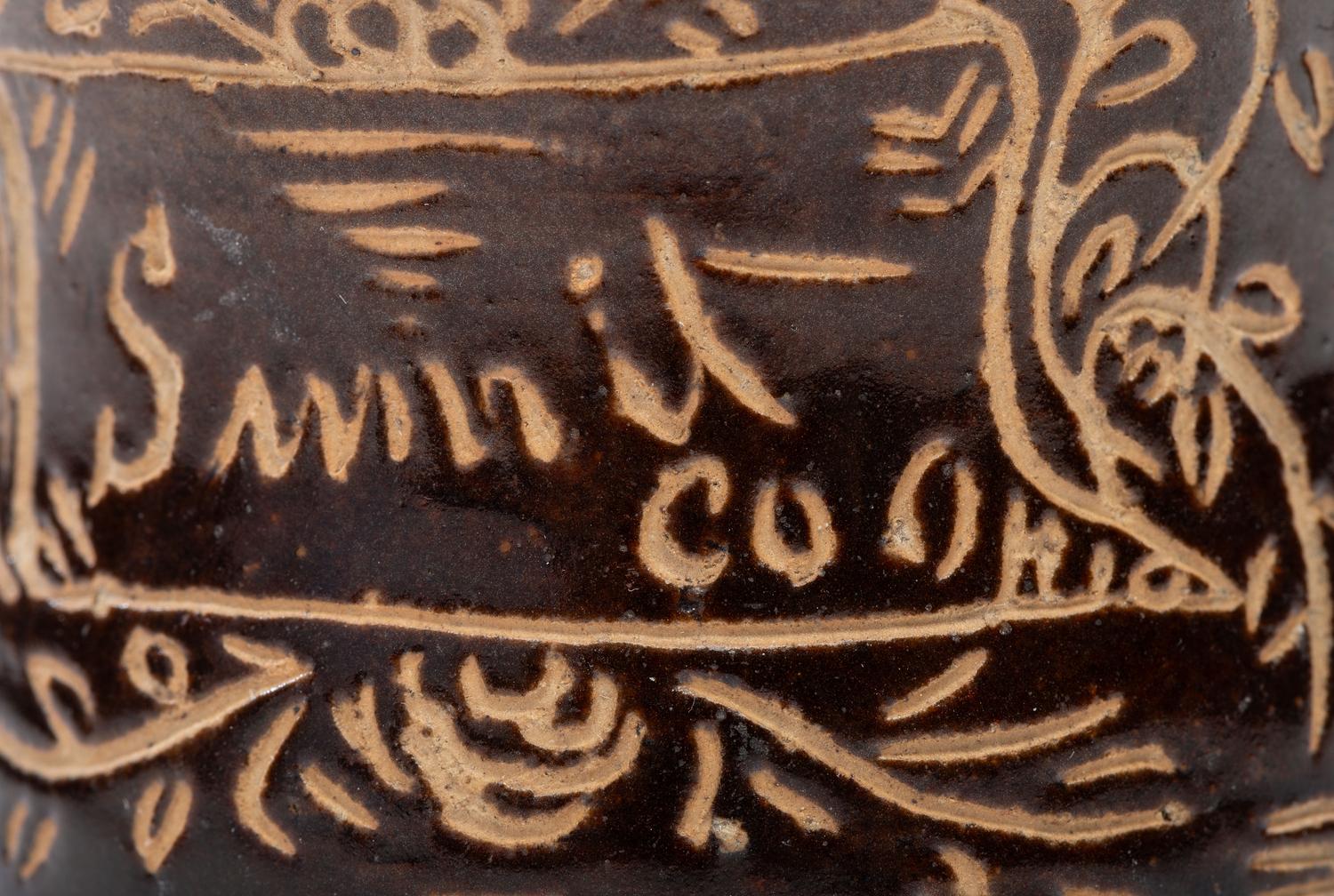 A Slip-Glazed and Incised Mug