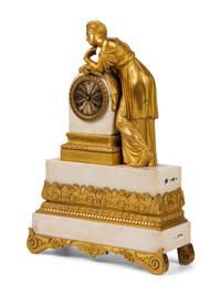 A Louis Philippe Gilt Bronze and White Marble Mantel Clock