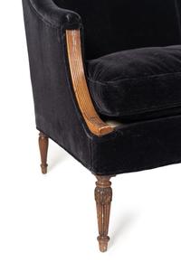 A Black Velvet Upholstered Sofa