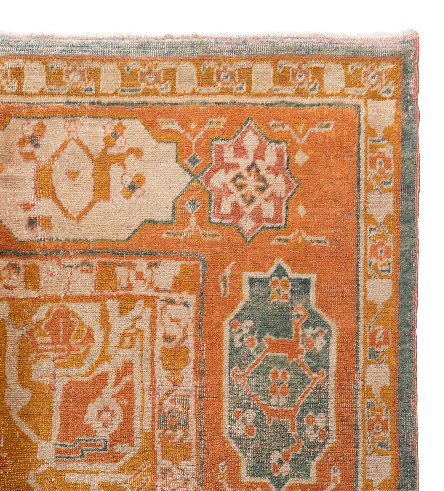 An Oushak Wool Rug