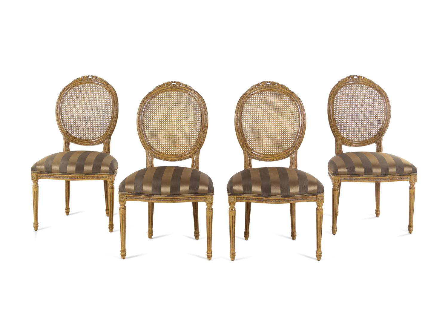 A Set of Four Louis XVI Style Caned Side Chairs