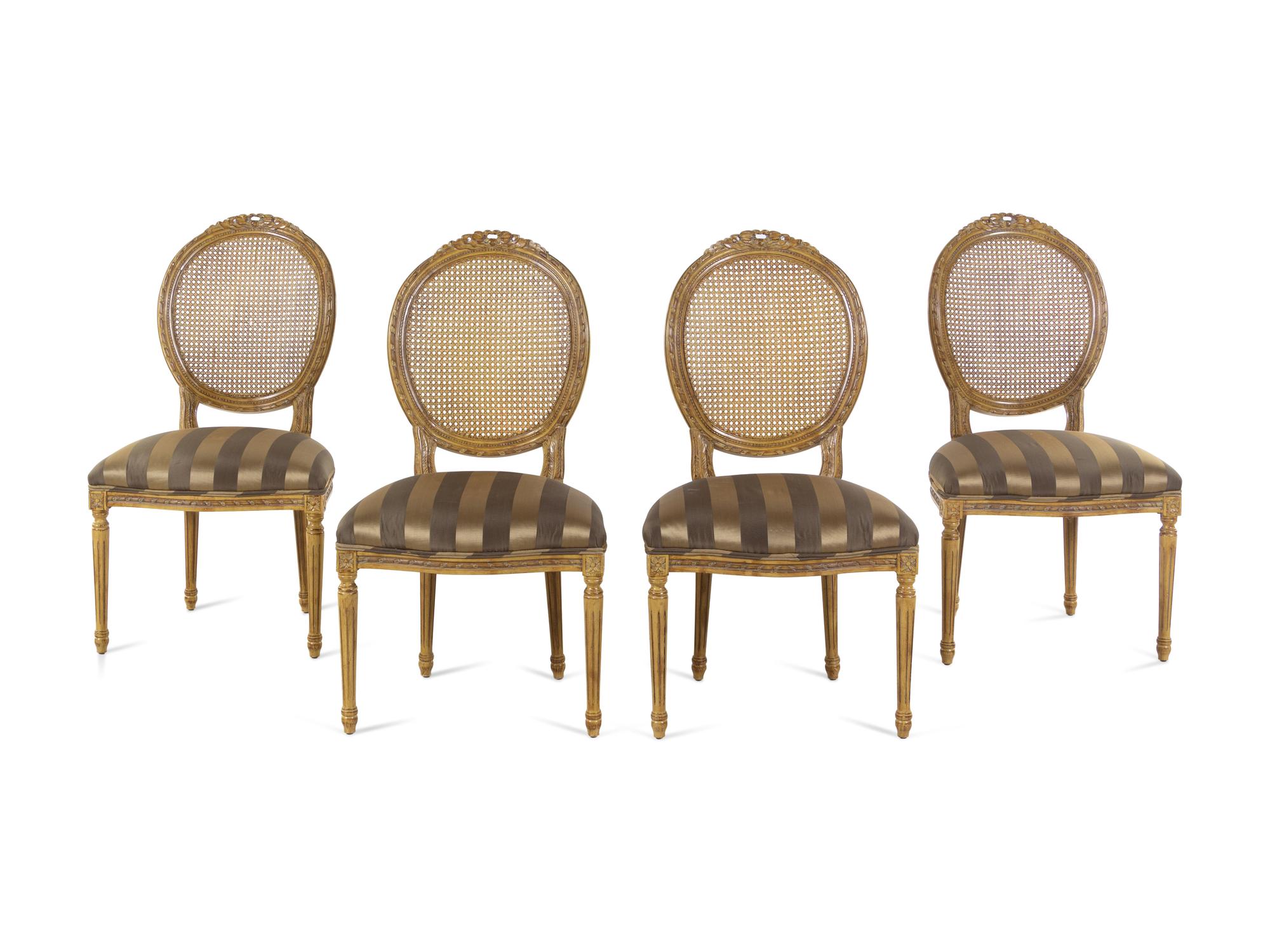 A Set of Four Louis XVI Style Caned Side Chairs