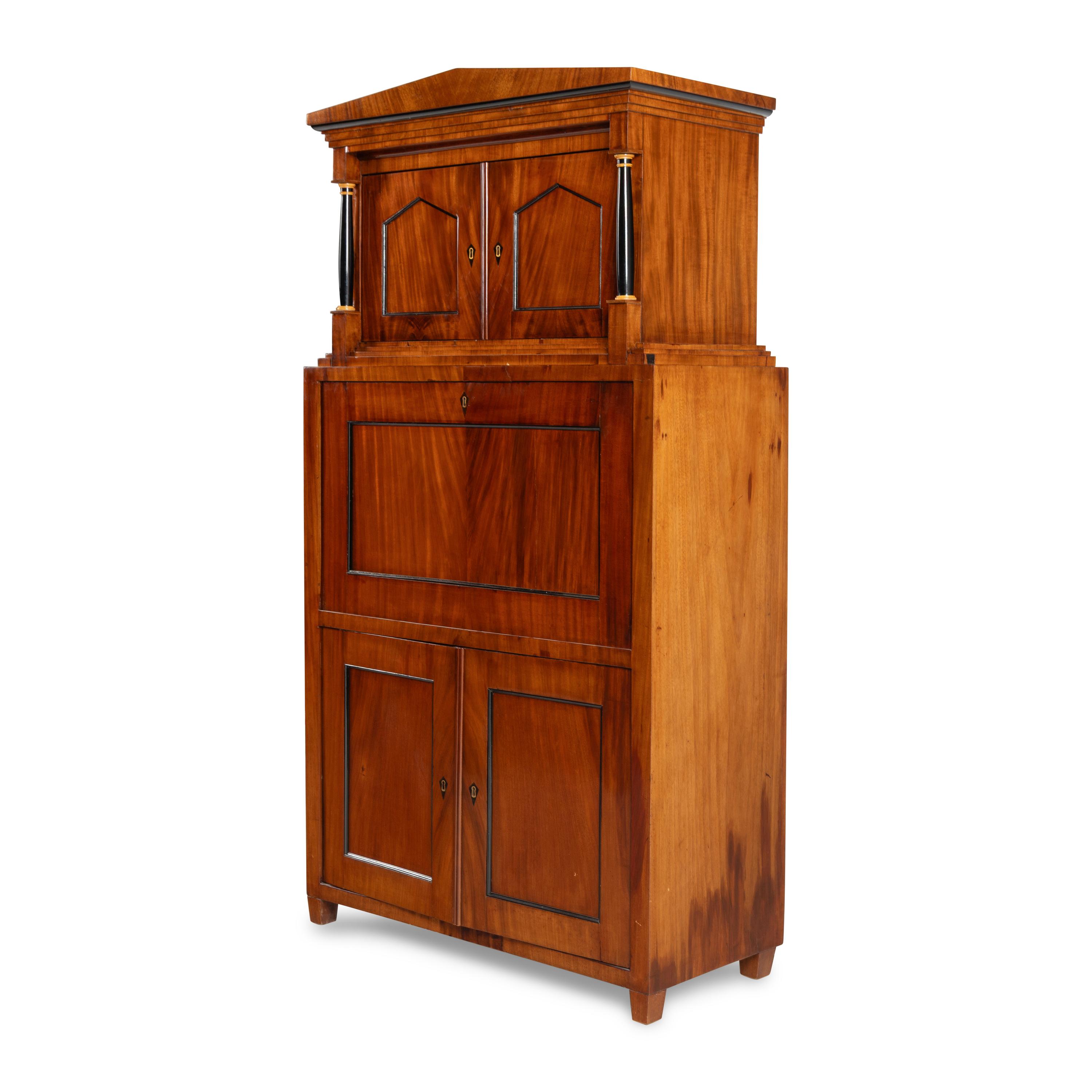 An Austrian Neoclassical Part-Ebonized Mahogany Bureau Cabinet