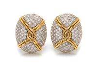 A Pair of Platinum, Yellow Gold and Diamond Earclips, 29.80 dwts.