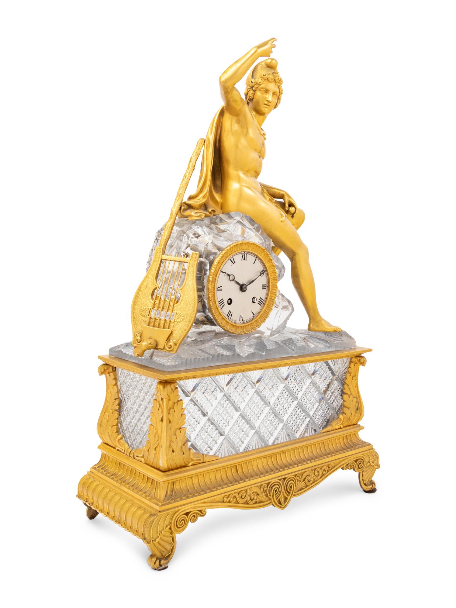 An Empire Style Gilt Bronze and Cut Glass Figural Mantel Clock