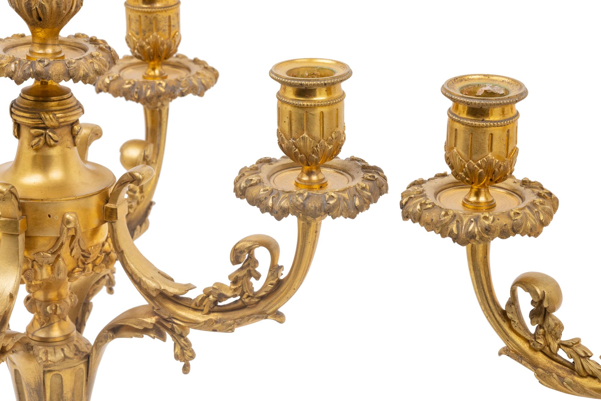 A Pair of Empire Style Gilt Bronze Six-Light Candelabra