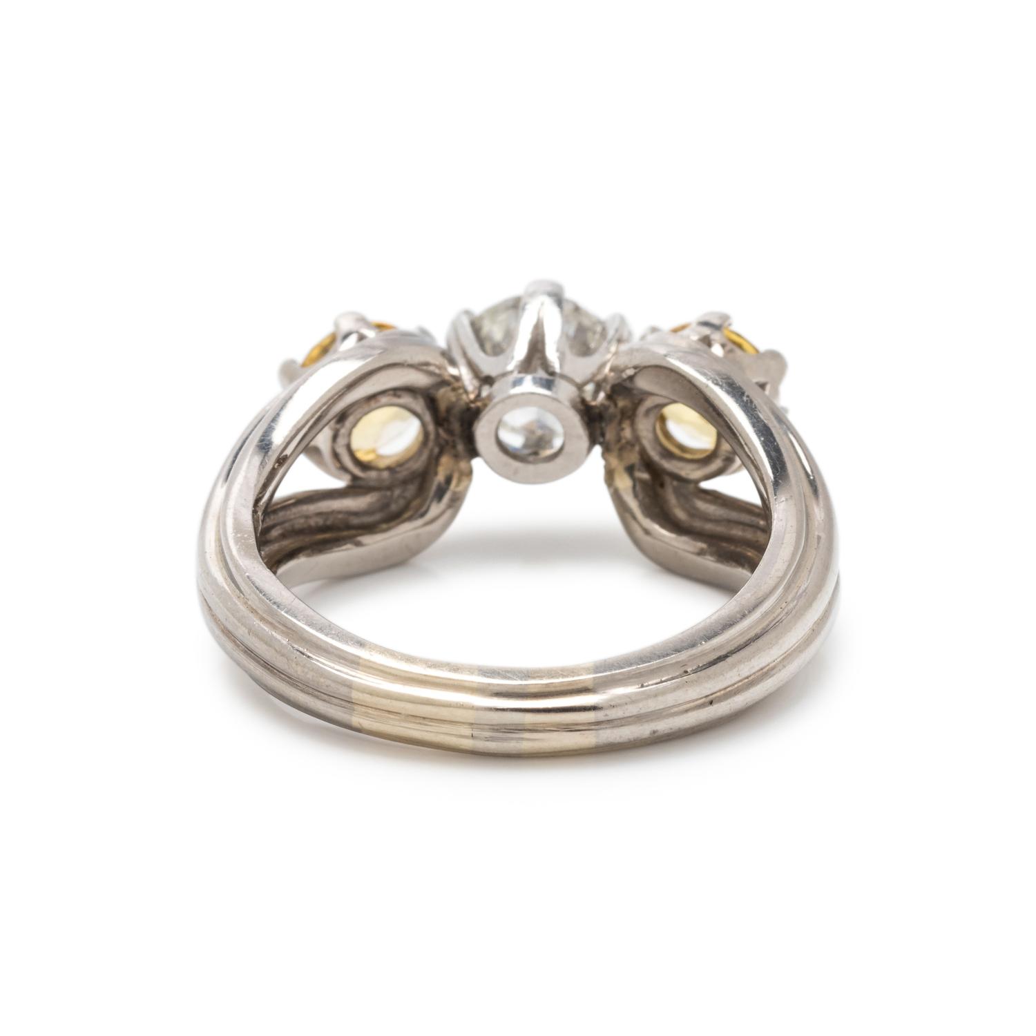DIAMOND AND YELLOW SAPPHIRE RING