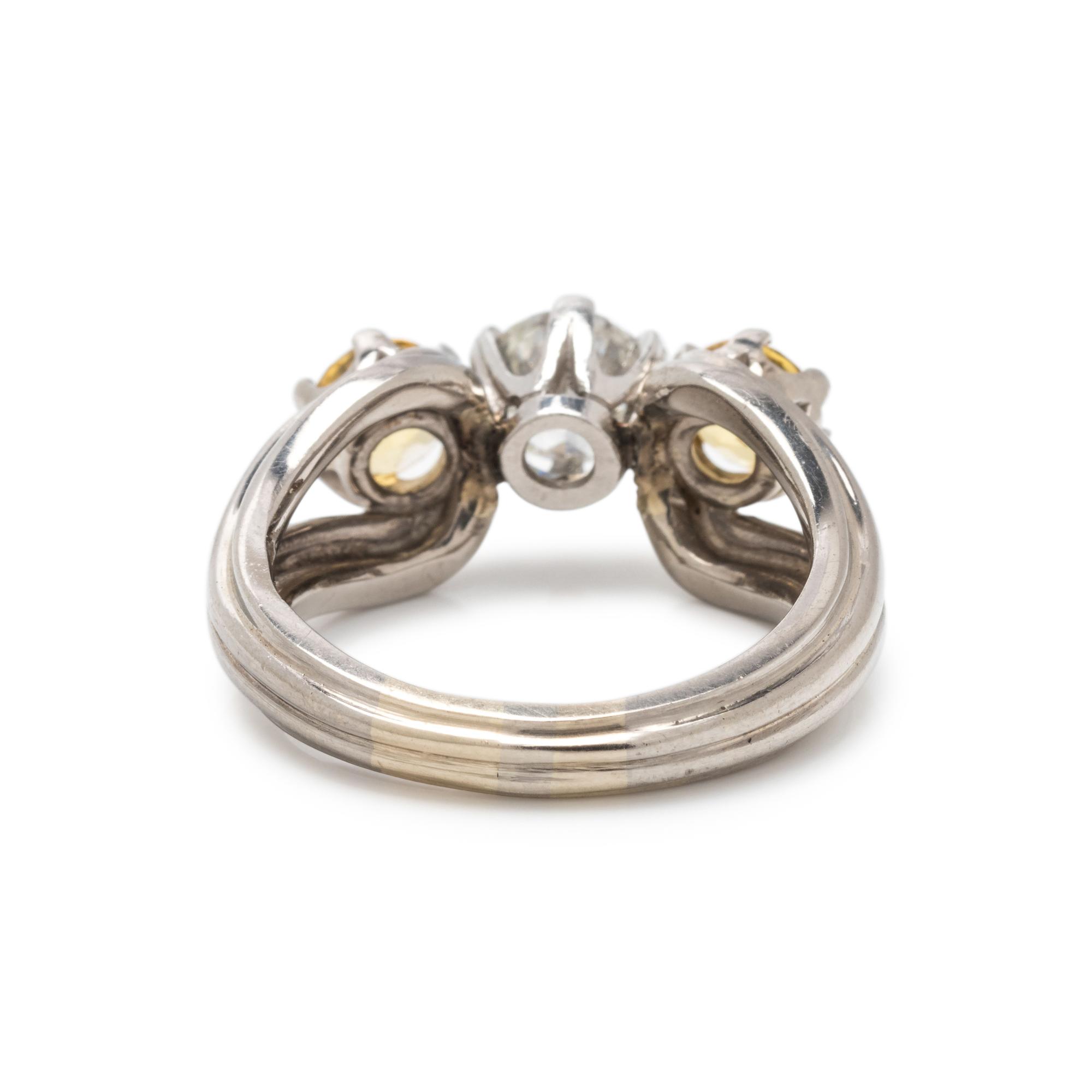DIAMOND AND YELLOW SAPPHIRE RING
