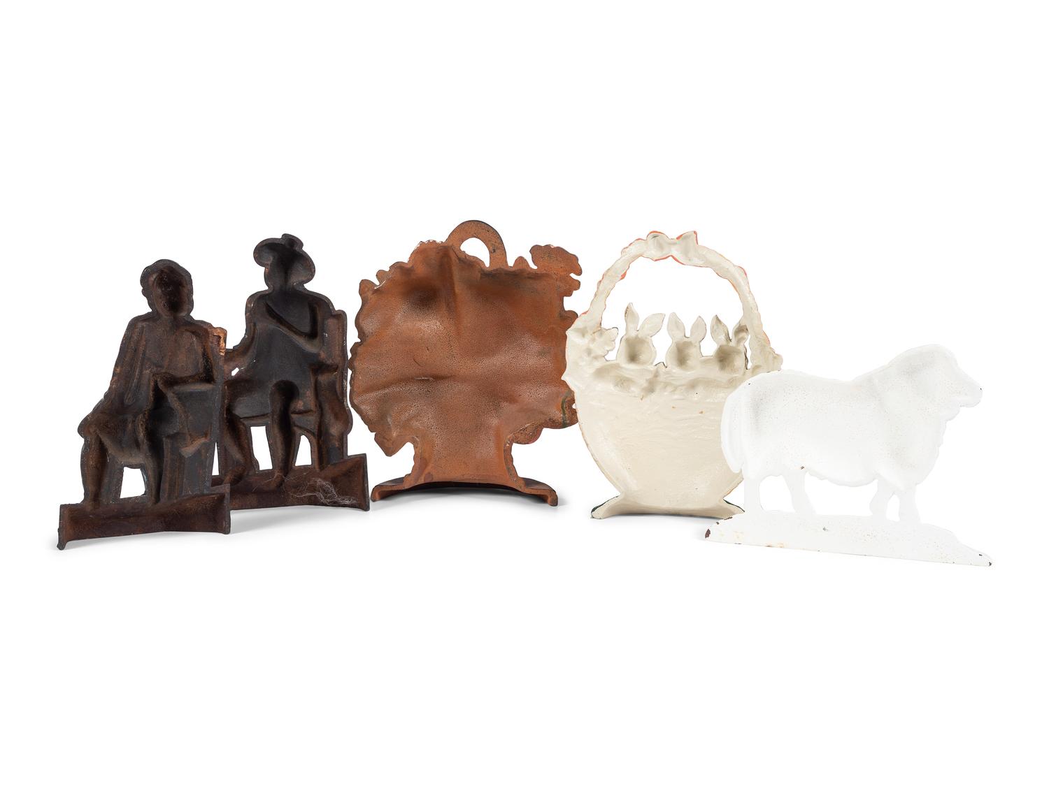 Five Figural Cast Iron Doorstops