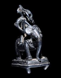 An Indian Bronze Figural Group of Ganesha Riding an Elephant