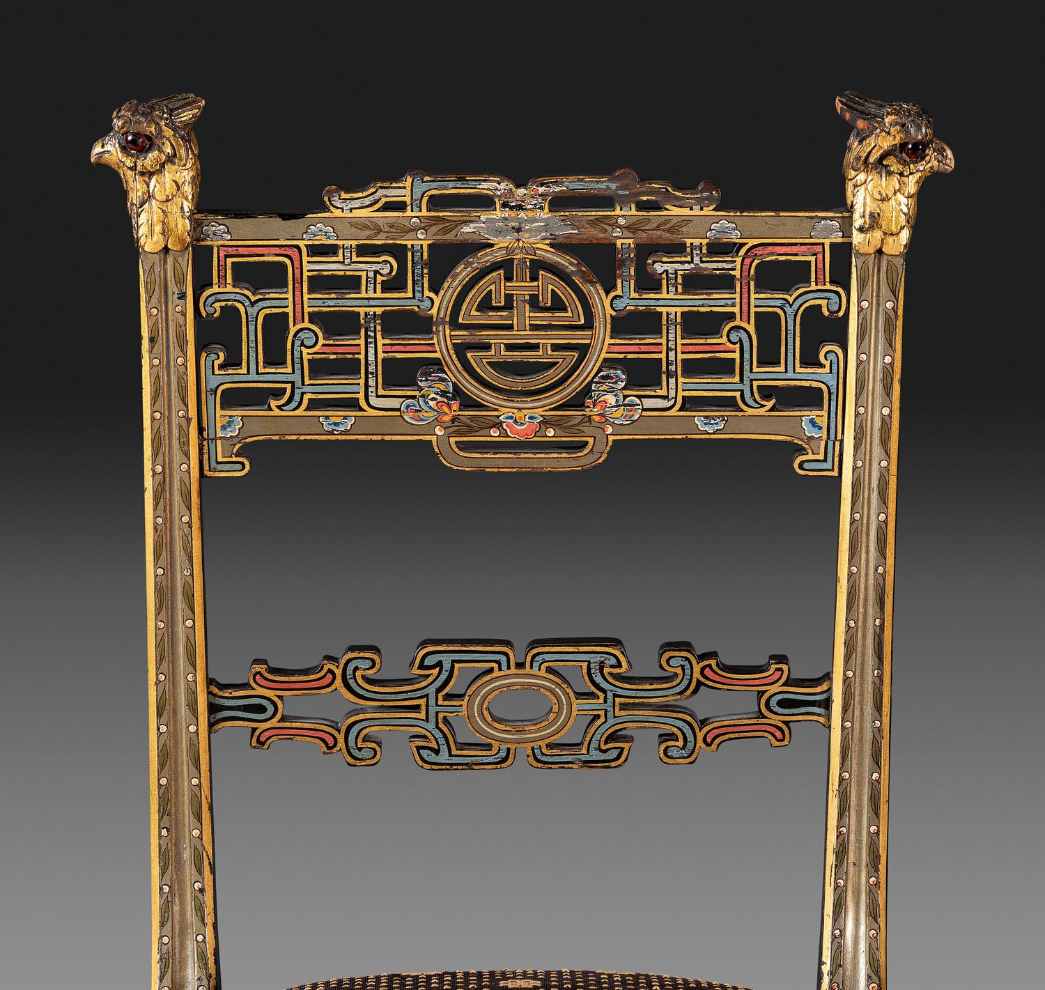 An Aesthetic Movement Painted, Parcel Gilt and Ebonized Bird-Carved Side Chair