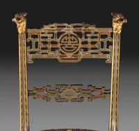 An Aesthetic Movement Painted, Parcel Gilt and Ebonized Bird-Carved Side Chair