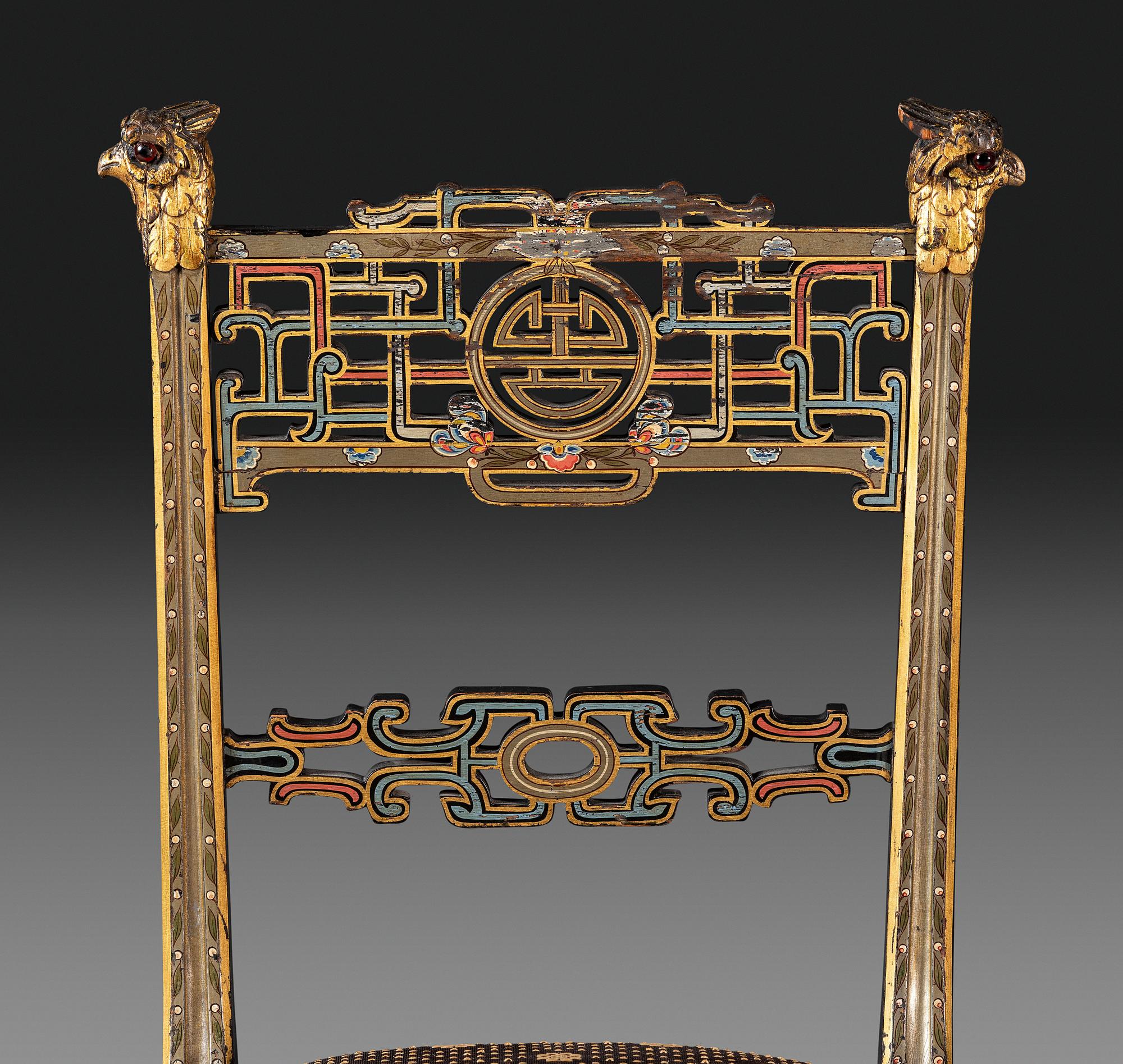 An Aesthetic Movement Painted, Parcel Gilt and Ebonized Bird-Carved Side Chair