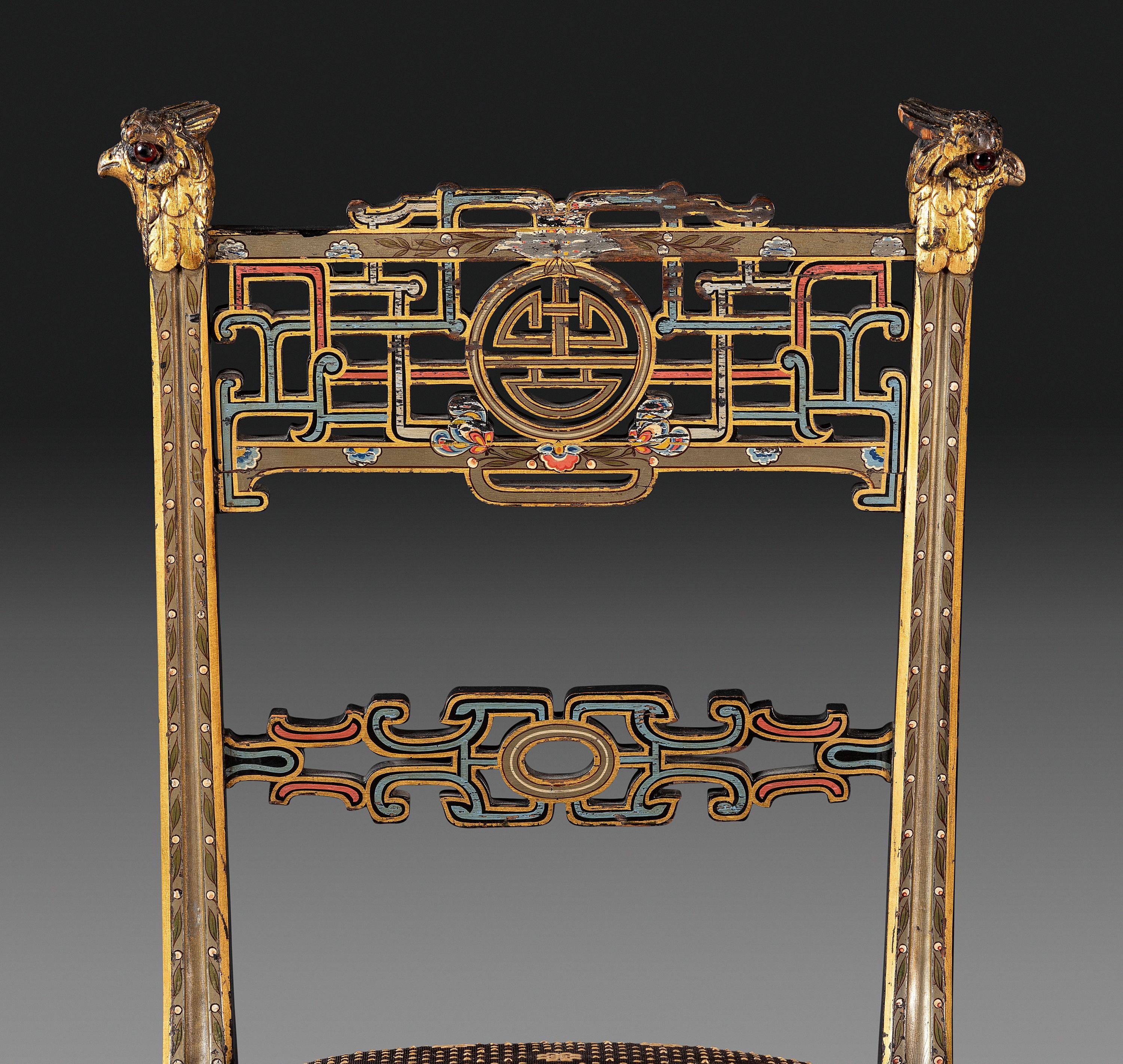 An Aesthetic Movement Painted, Parcel Gilt and Ebonized Bird-Carved Side Chair