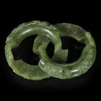 A Chinese spinach jade double ring 碧玉御题诗蚩尤环