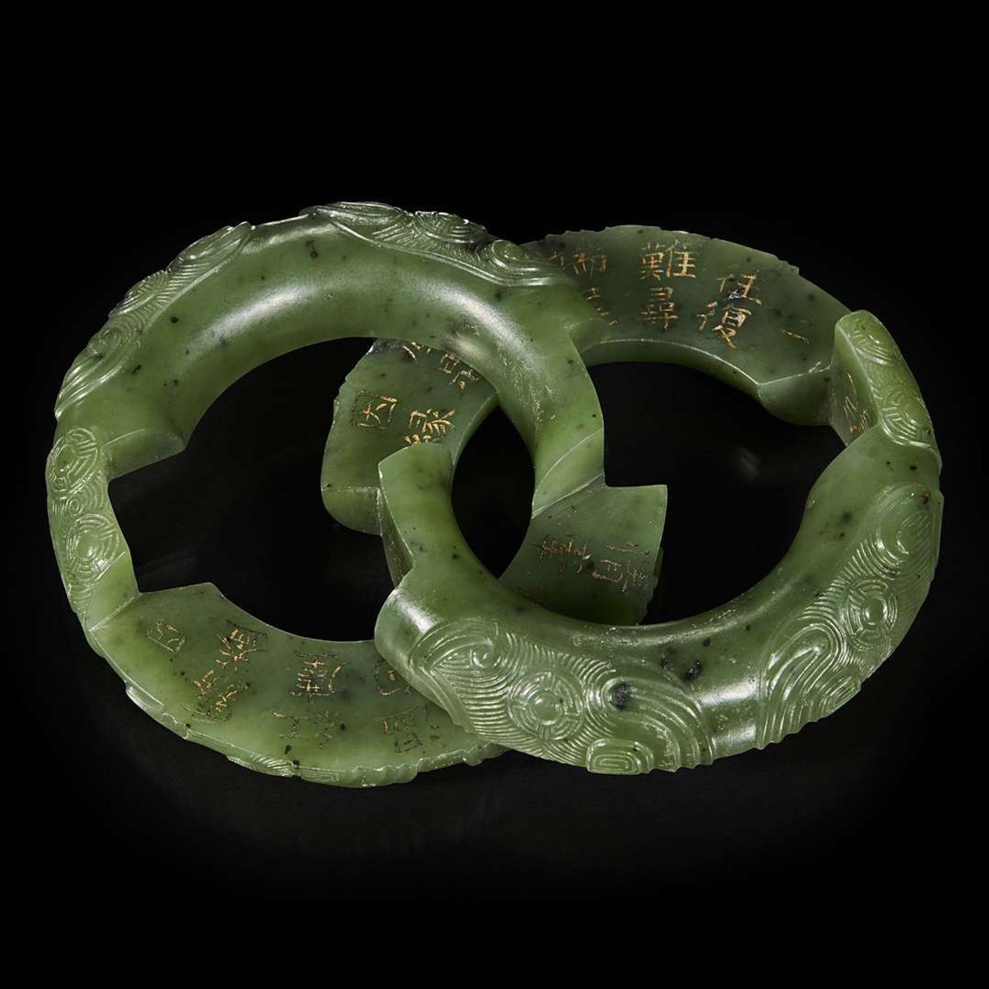 A Chinese spinach jade double ring 碧玉御题诗蚩尤环