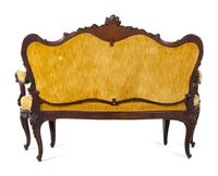 A Rococo Revival Carved Walnut Settee