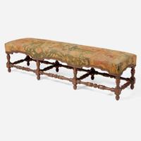 A Baroque Revival carved walnut bench with kilim upholstery late 19th / early 20th century