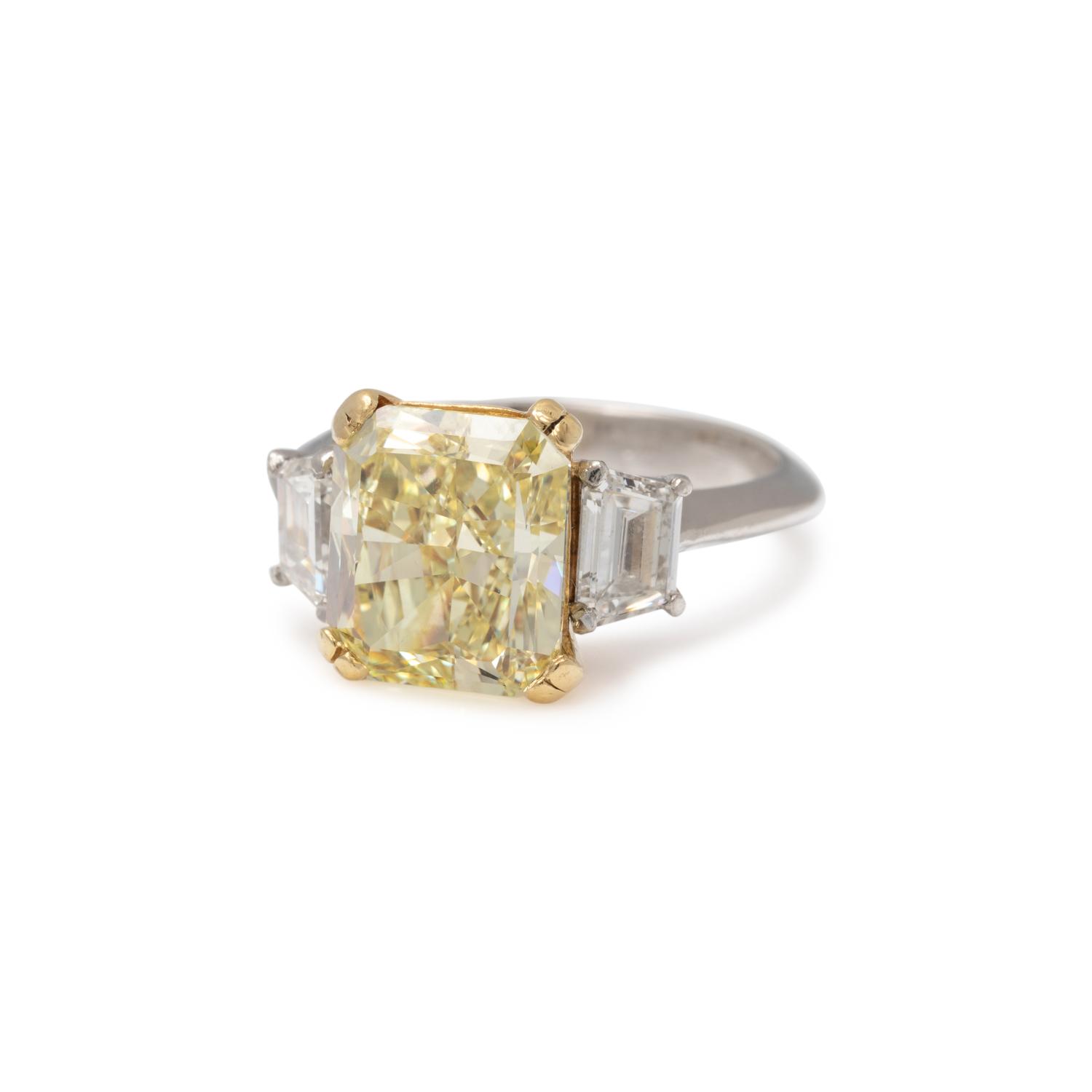 FANCY YELLOW DIAMOND AND DIAMOND RING