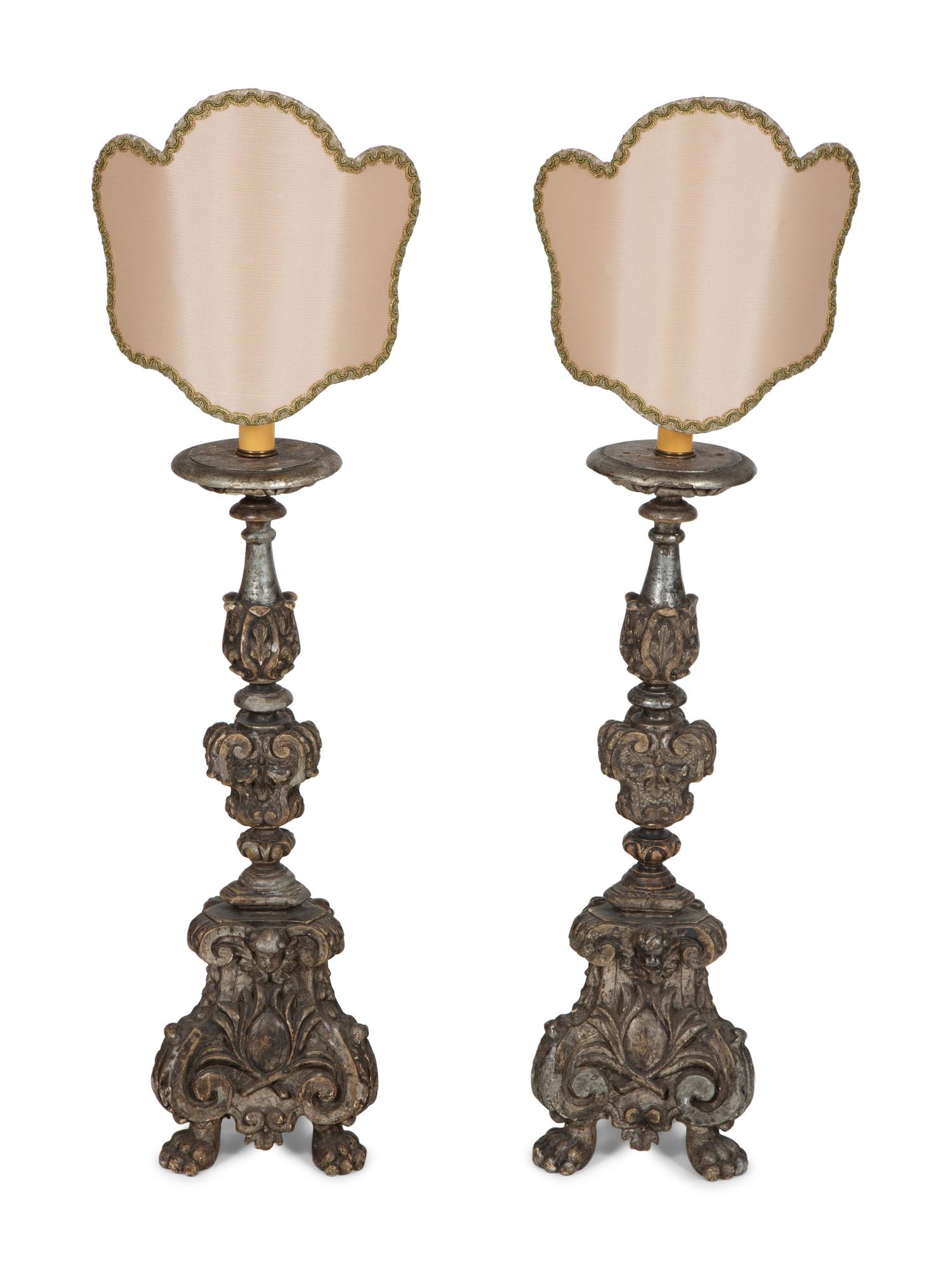 A Pair of Italian Carved and Silvered Wood Pricket Sticks