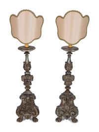 A Pair of Italian Carved and Silvered Wood Pricket Sticks