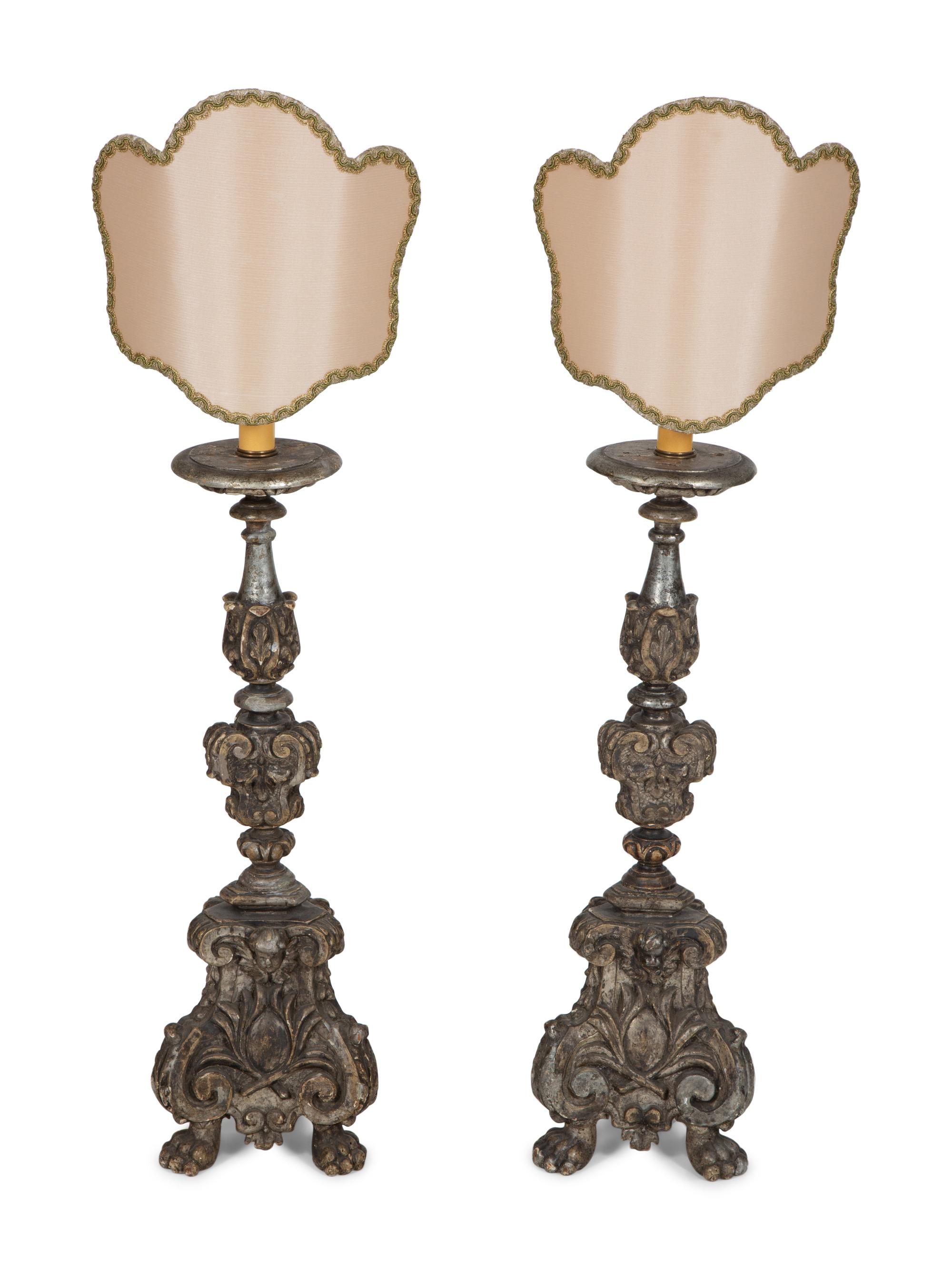 A Pair of Italian Carved and Silvered Wood Pricket Sticks