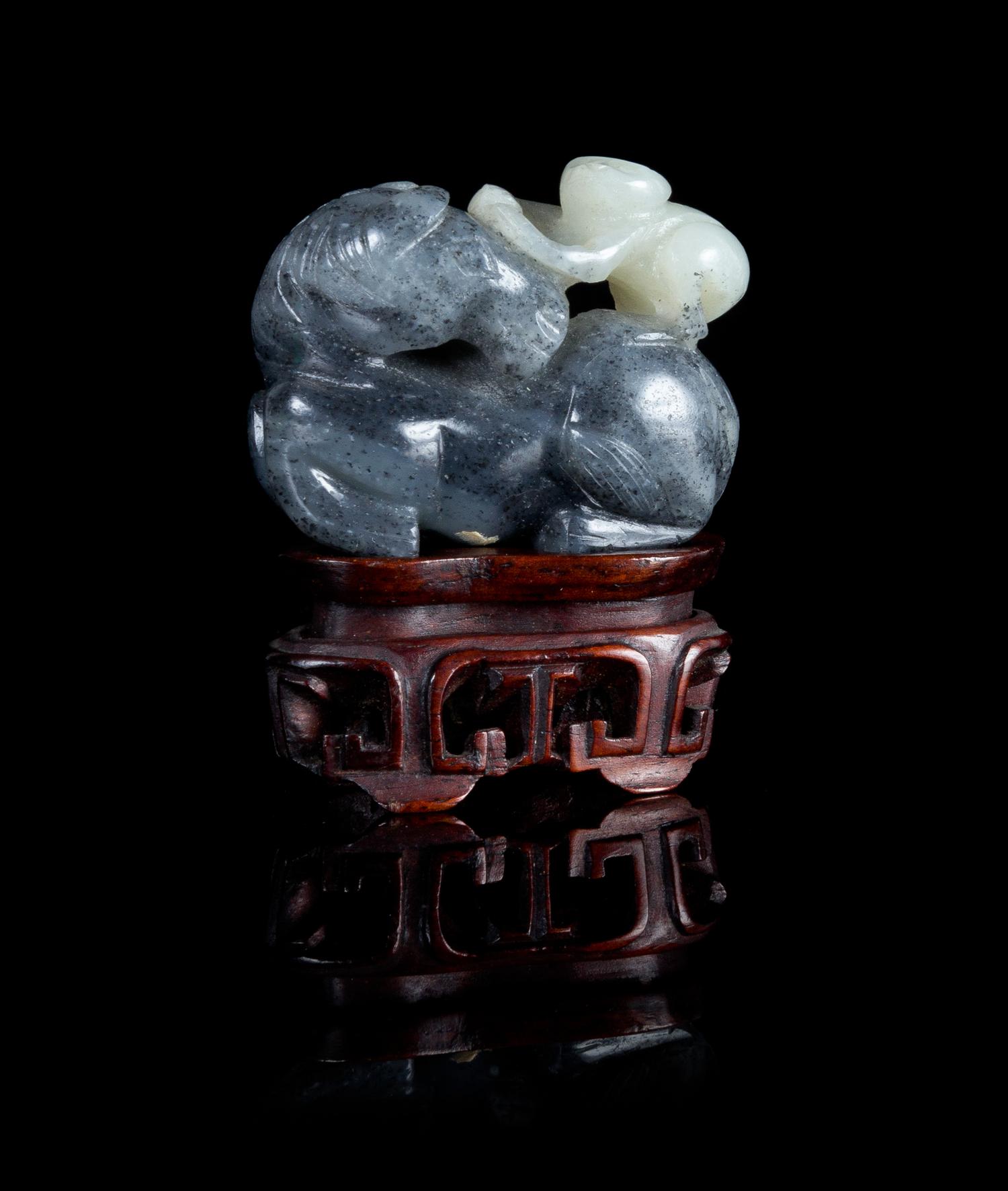 A Carved Black and White Jade 'Horse and Monkey' Figural Group — 18TH CENTURY