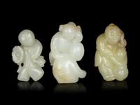 Three Chinese Jade Figures of Boys