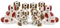 Four Pairs of Staffordshire Spaniels Height of tallest pair 12 inches.
