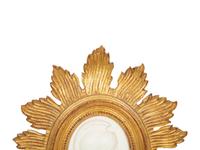 A Pair of Italian Bisque Portrait Medallions in Giltwood Frames