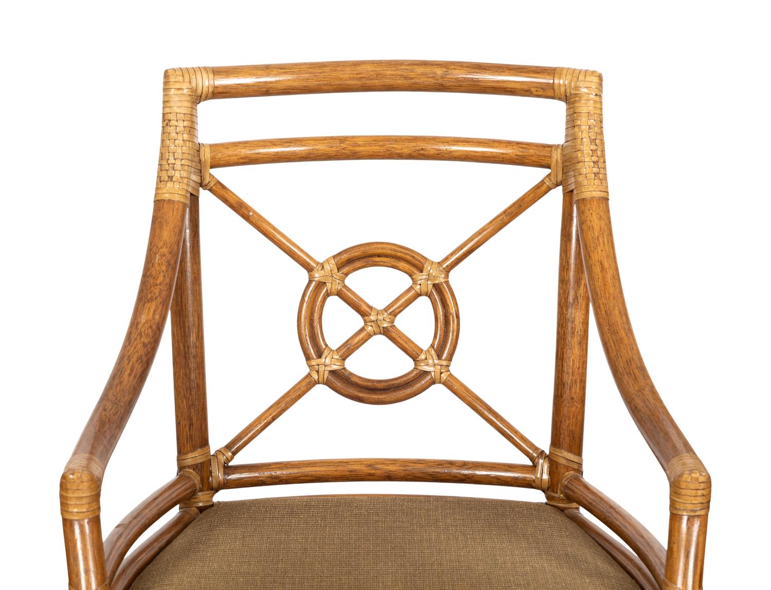 A Set of Four McGuire Rattan Target Armchairs and an Organic Bamboo Table