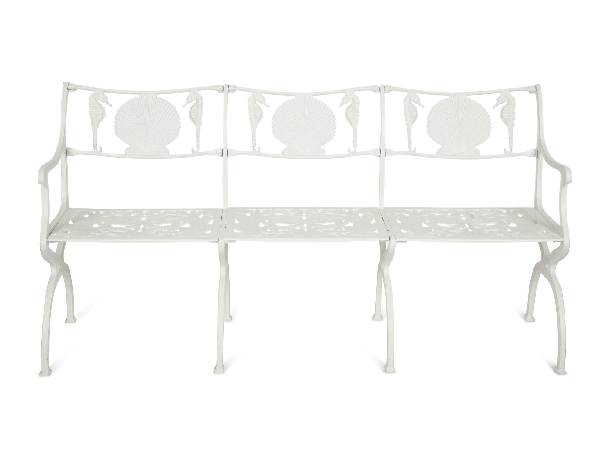 A Suite of White-Painted Cast Metal Garden Furniture