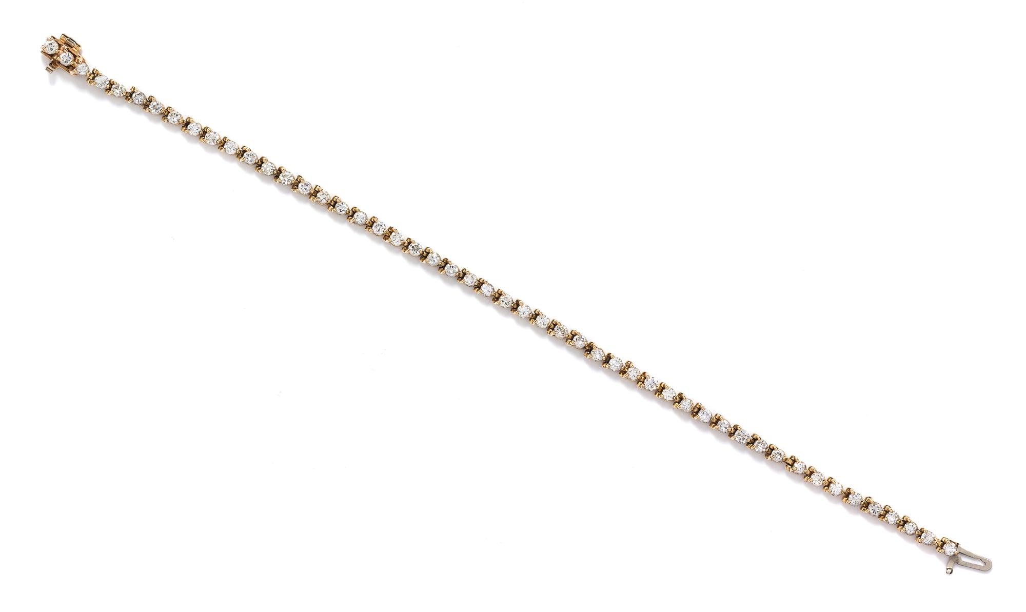 A 14 Karat Yellow Gold and Diamond Bracelet, 5.00 dwts.
