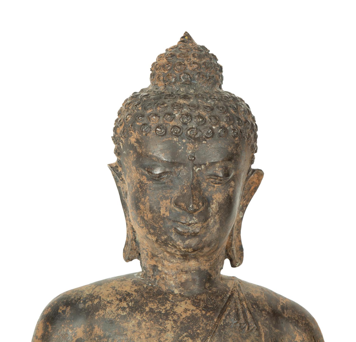 A Patinated Bronze Seated Buddha