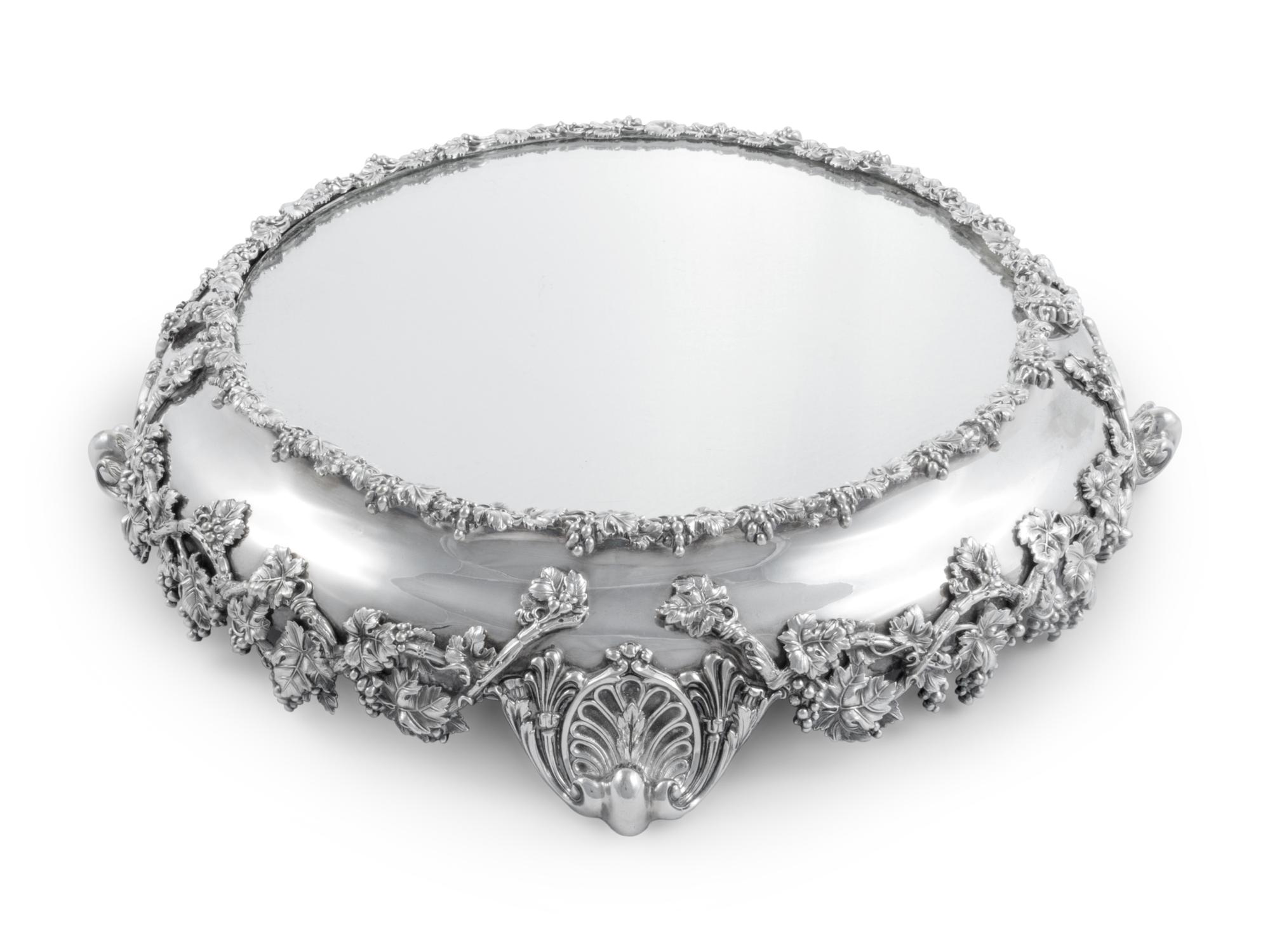 A Silver-Plate and Mirror-Inset Table Plateau