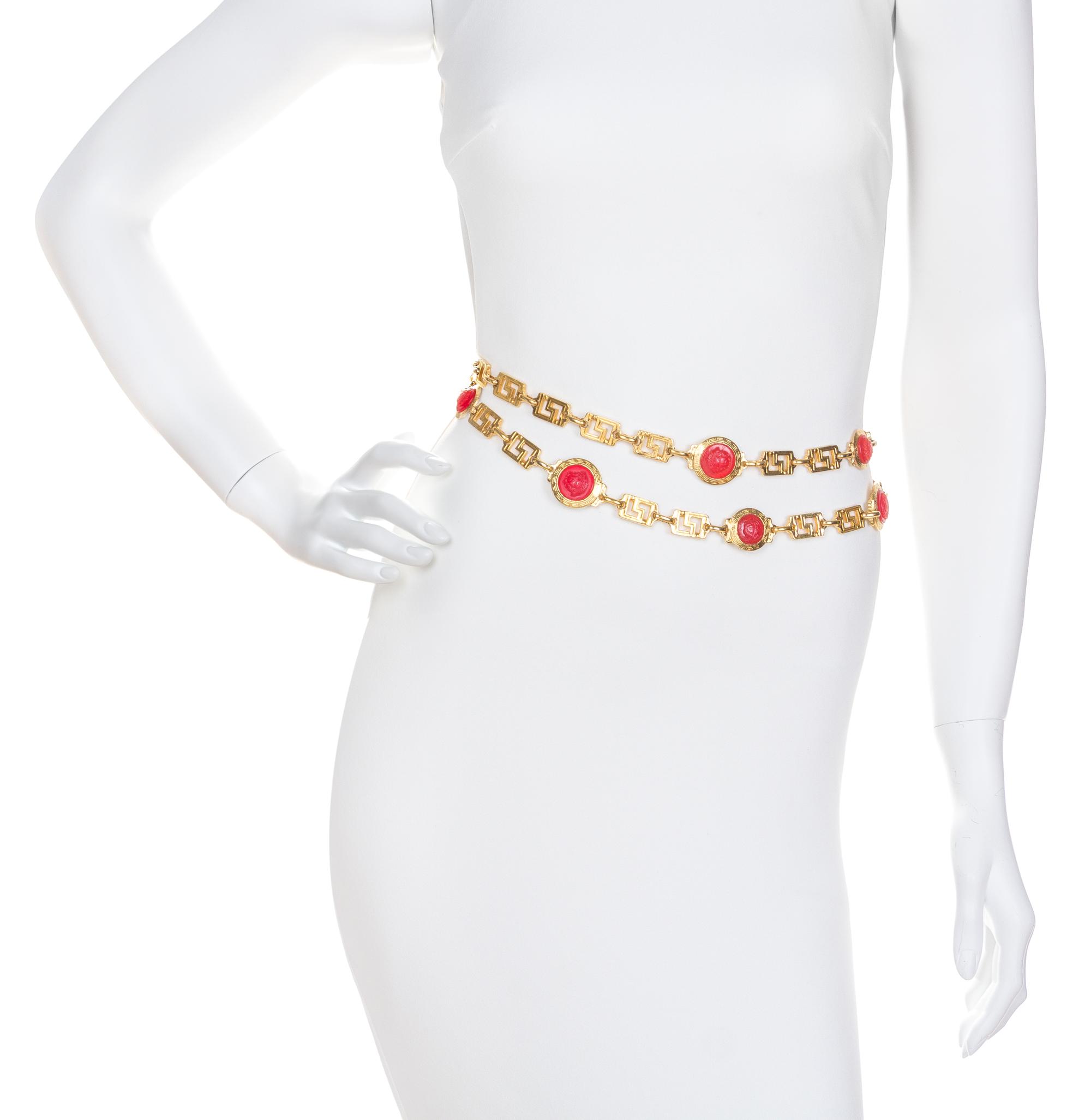 A Gianni Versace Red Embossed Medusa Medallion and Greco Link Belt,
