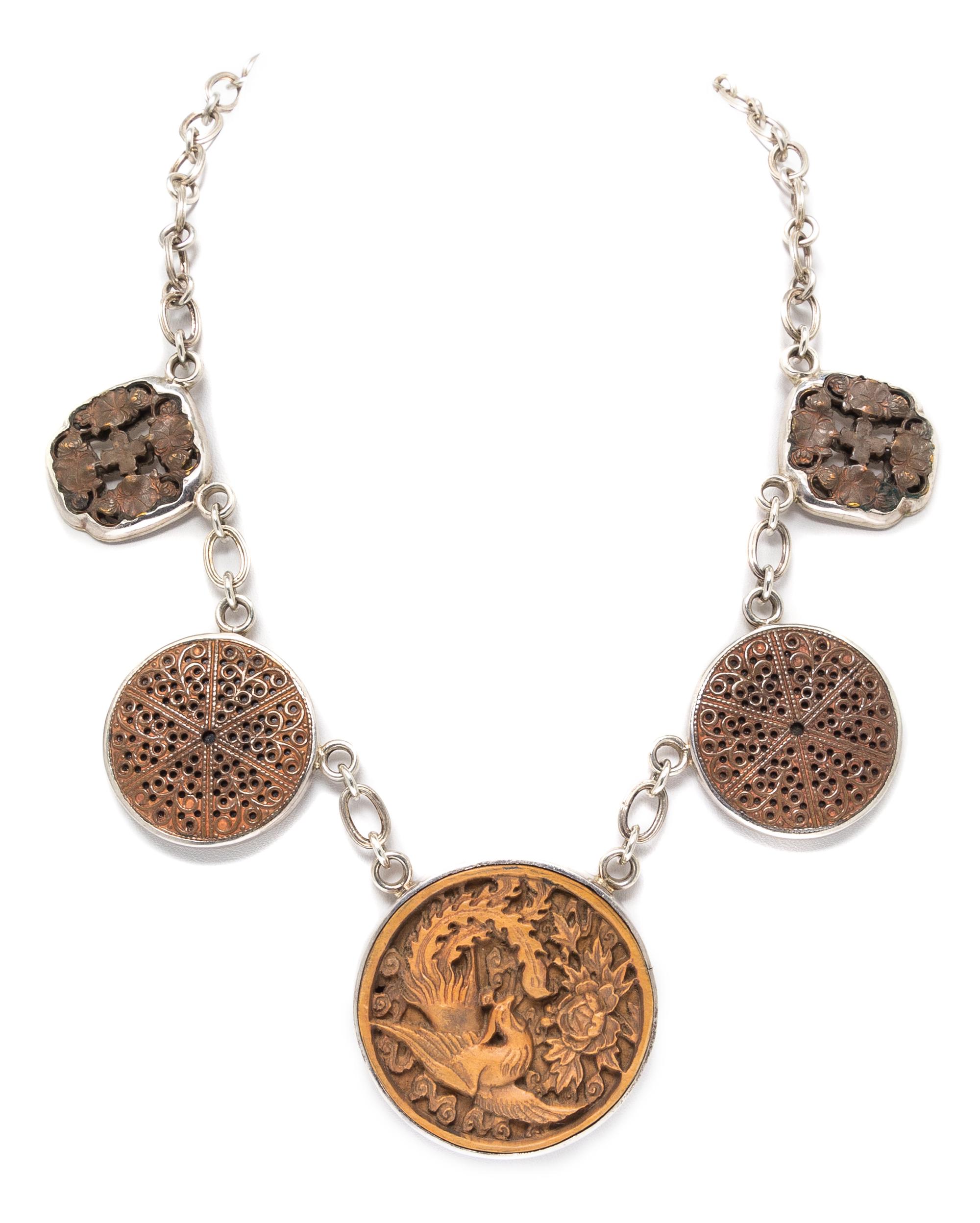 A Silver, Copper and Carved Wood Necklace, 80.70 dwts.
