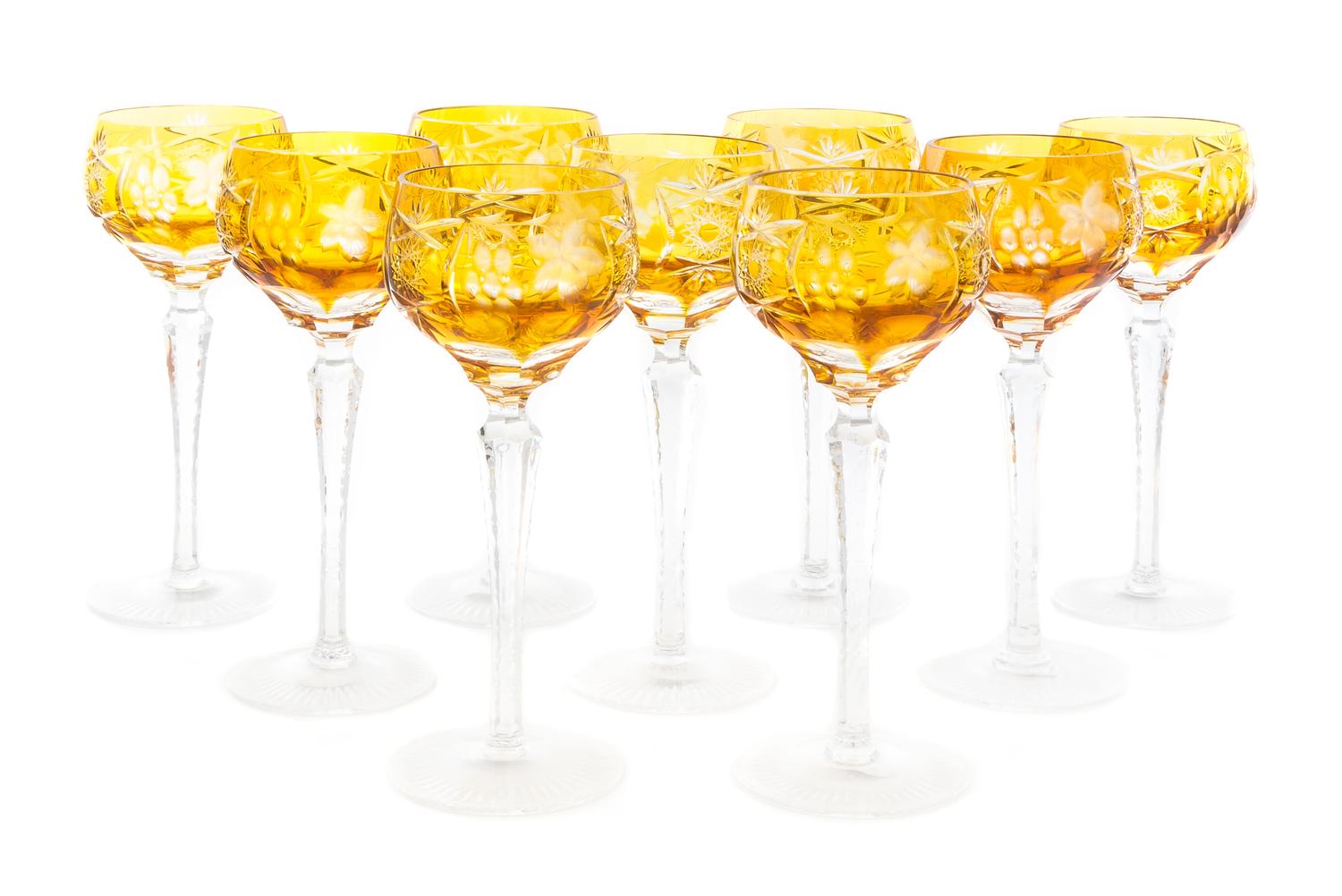A Set of Nine Amber Cut to Clear Glass Wine Stems Height 8 3/8 inches.