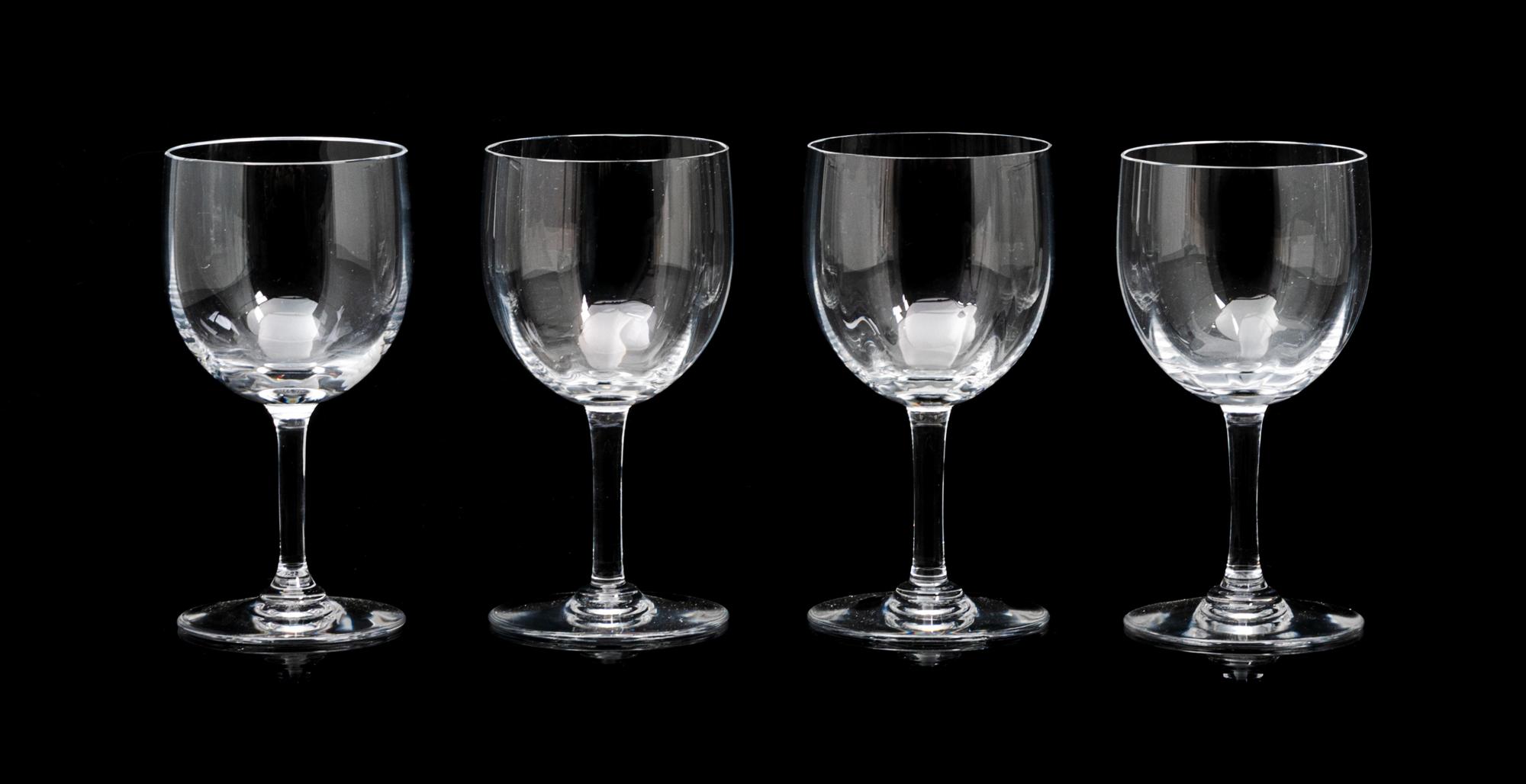 A Set of Eleven Baccarat Wine Glasses Height 5 inches.