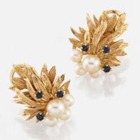 A collection of gold, cultured pearl, and sapphire jewelry
