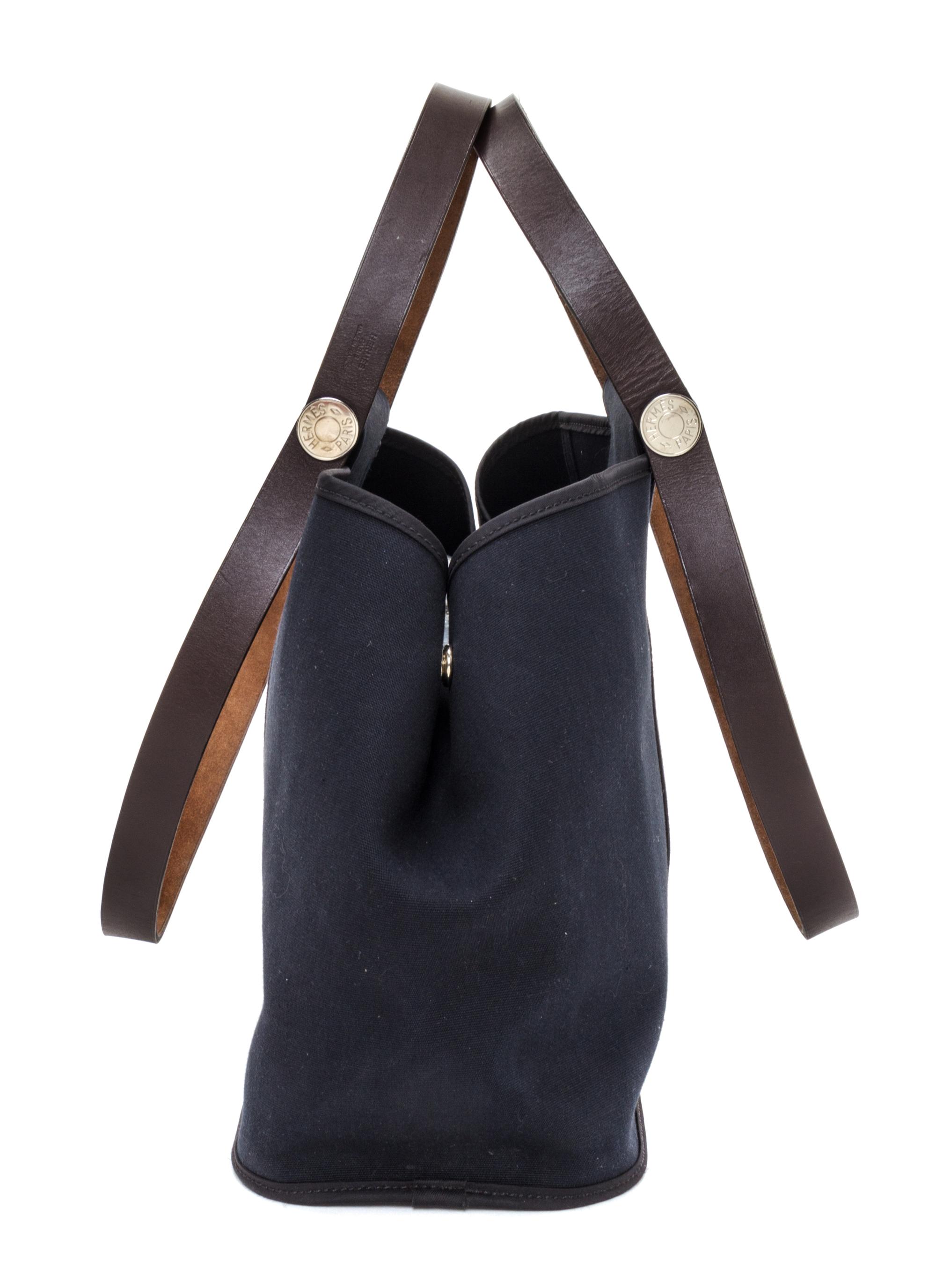 An Hermes Black Canvas Cabag Elan Tote, 10" x 14" x 5.5".