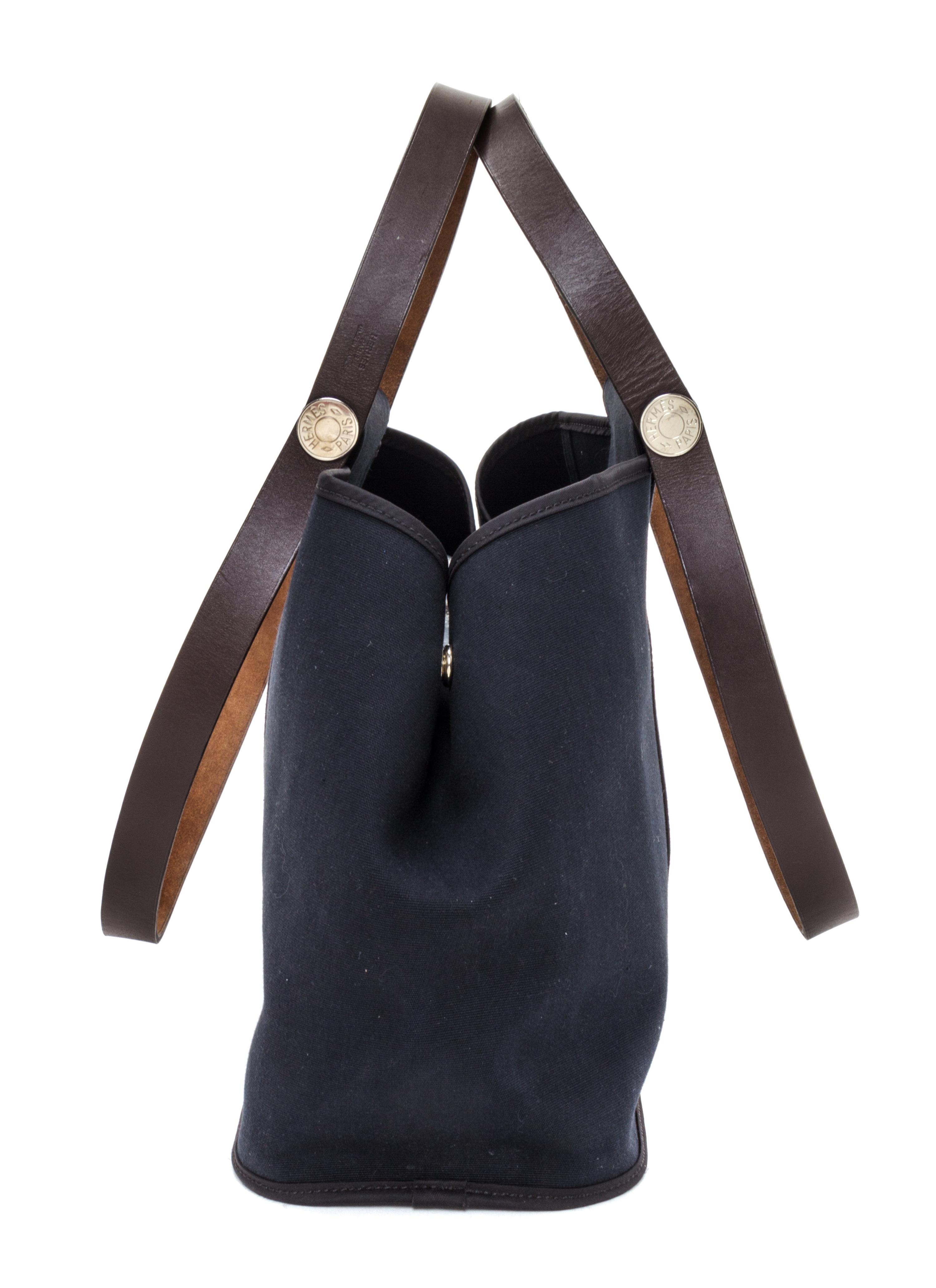 An Hermes Black Canvas Cabag Elan Tote, 10" x 14" x 5.5".